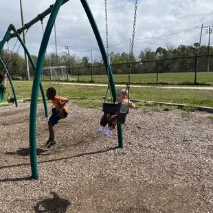 4 regular swings, 1 baby, 1 handicap swing