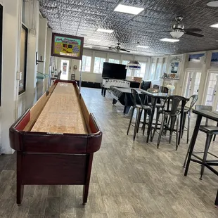 a shuffle table and bar