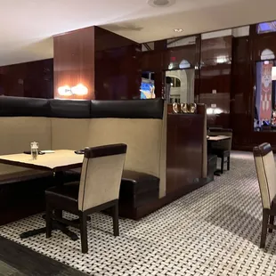 a dining area with booths and tables