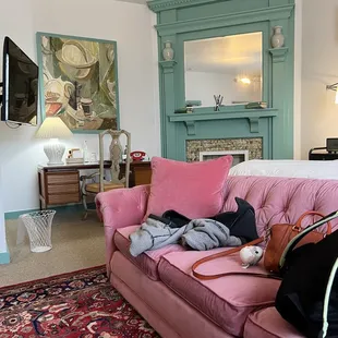 Second floor bedroom with soft couch.