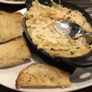 Artichoke dip we hardly ate as it was served with our entrees instead of as an appetizer, as ordered.