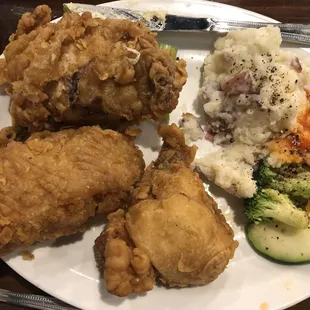 Fried chicken, very tender but only 4 pieces of veggies? sloppy spilled hot sauce, came out of the kitchen served like this by a young man.