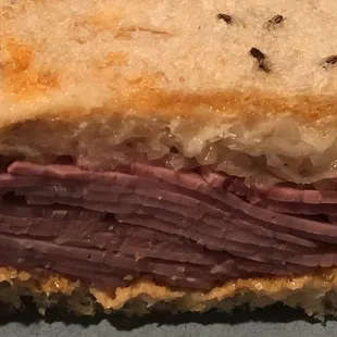 This is like counting the rings on A stump, I see between 12 and 14 layers.