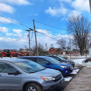 Farm tractors across the street.