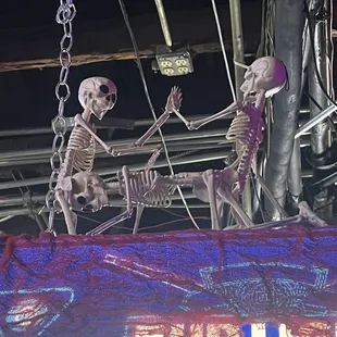 two skeletons playing a game