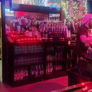 a bar with red lights