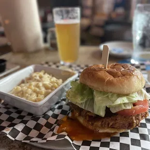 Southern style chicken sandwich with wing sauce and delicious Mac and cheese!  Must get!