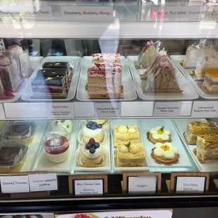 a display of cakes and pastries