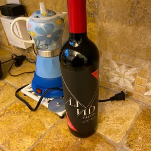 a bottle of wine and a blender