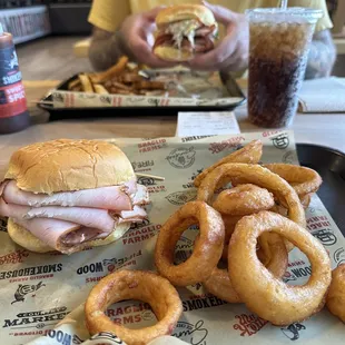 Pit Turkey Sandwich with onion rings, plus a pit turkey sandwich with coleslaw and fries