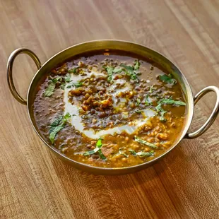 Daal Makhni, a black lentil soup with Indian spices.