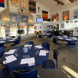 a large room with tables and chairs