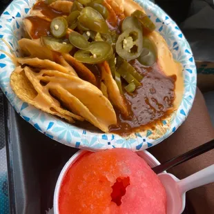 a plate of food and a bowl of sauce