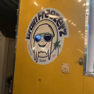 a sticker on the door of a food truck