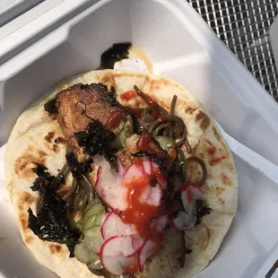  taco in a styrofoam container