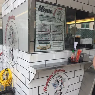  woman standing in front of a food truck