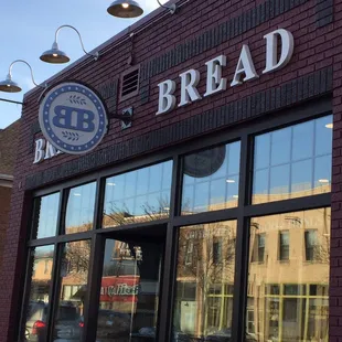 the reflection of the building across the street