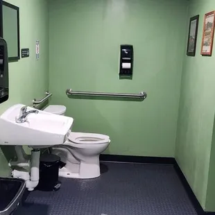 Very clean unisex bathroom.