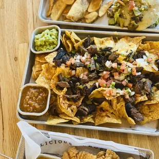 Nachos, boneless wings, green chili burger.