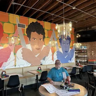 The art and lighting in this place .