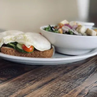 Avocado Toast with an added egg and side salad with balsamic vinaigrette