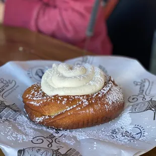 Capshaw Cinnamon Roll-- flash fried jumbo cinnamon roll, cream cheese frosting