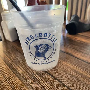 a drink in a plastic cup