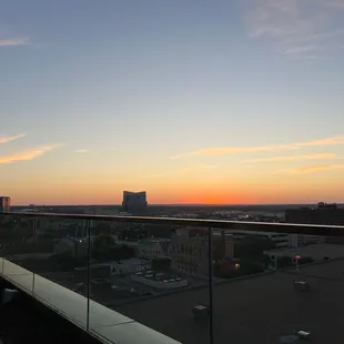 a view of a city at sunset