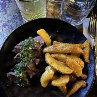 steak and french fries on a plate
