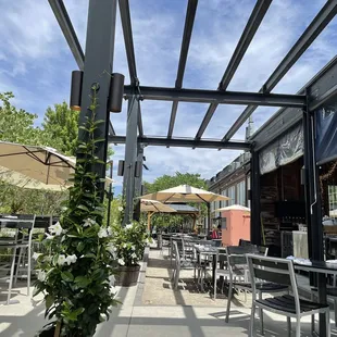 Part of the expansive outdoor patio space / July 2022