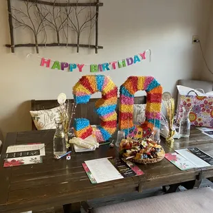 Reserved table for my friends 30th birthday with custom board.