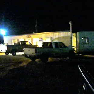 a truck parked in front of a building