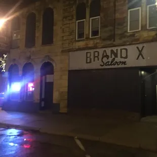 a police car parked in front of a building