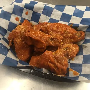a basket of chicken wings