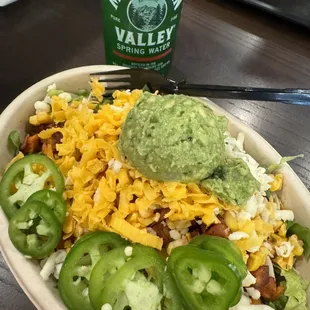 Build my own salad bowl. I got salsa and dressing on the side! Also, they serve my favorite water!