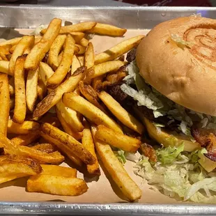 a tray of fries and a burger
