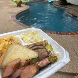 3meat plate (ribs 5 Stars, brisket 4 stars, and jalapeño cheese sausage 4.5 stars) with Mac and cheese and potato salad.  Ribs are the star