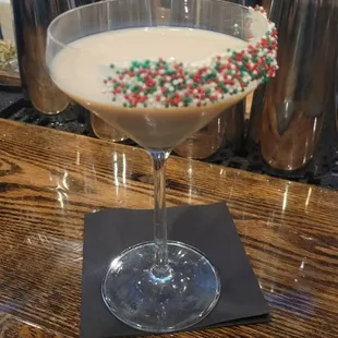 a martini with sprinkles in it