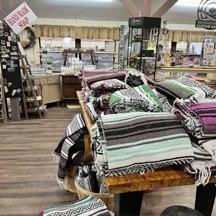 a variety of blankets on display