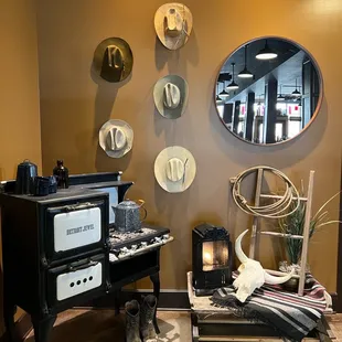 an old fashioned stove with a thank you sign on the wall