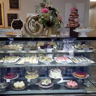 a display of cakes