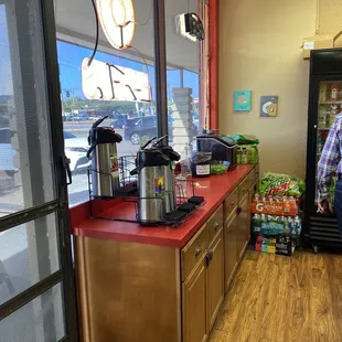 a man standing in a coffee shop