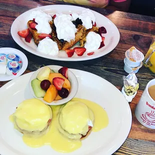 Eggs Benedict with a side of Fresh Fruit. My baby Girl ordered Crunchy French Toasts topped with whipped cream and strawberry&apos;s.