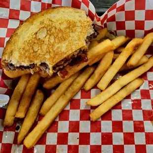 Patty Melt. On sourdough, lightly toasted with fries.