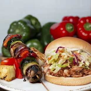 a bbq sandwich on a plate