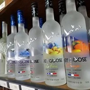 a row of bottles on a shelf