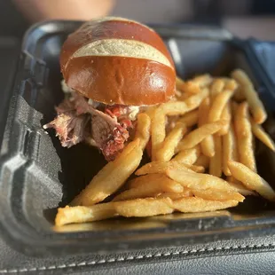 Pulled pork sandwich with fries