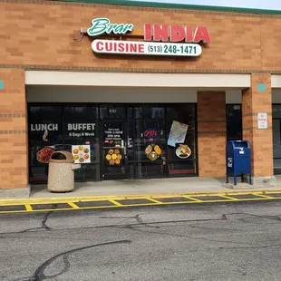 Front of restaurant. Located in a strip mall.