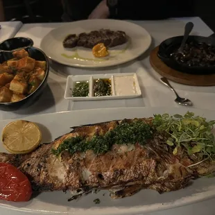 a whole fish on a plate