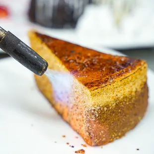 Flaming cheesecake (caramelizing the sugar)